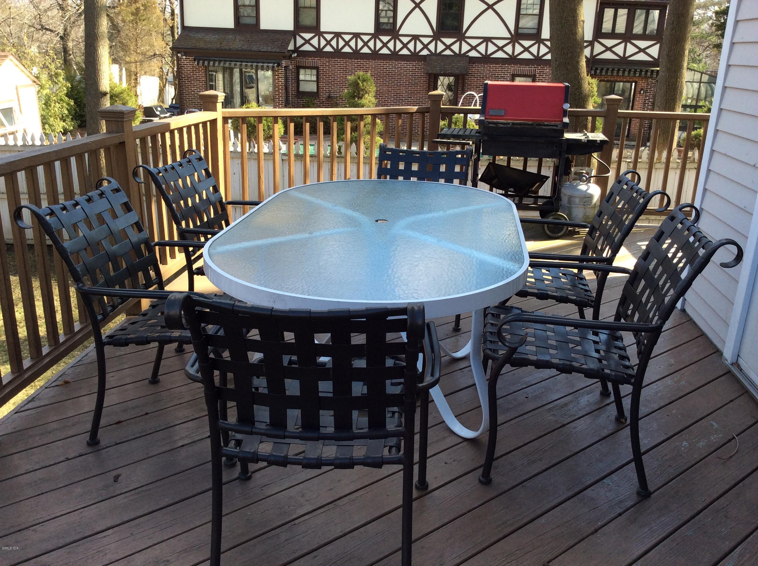 3 Stanwich Road Greenwich, CT 06830 - Photo 13 of 17 a view of a chairs and table on the deck
