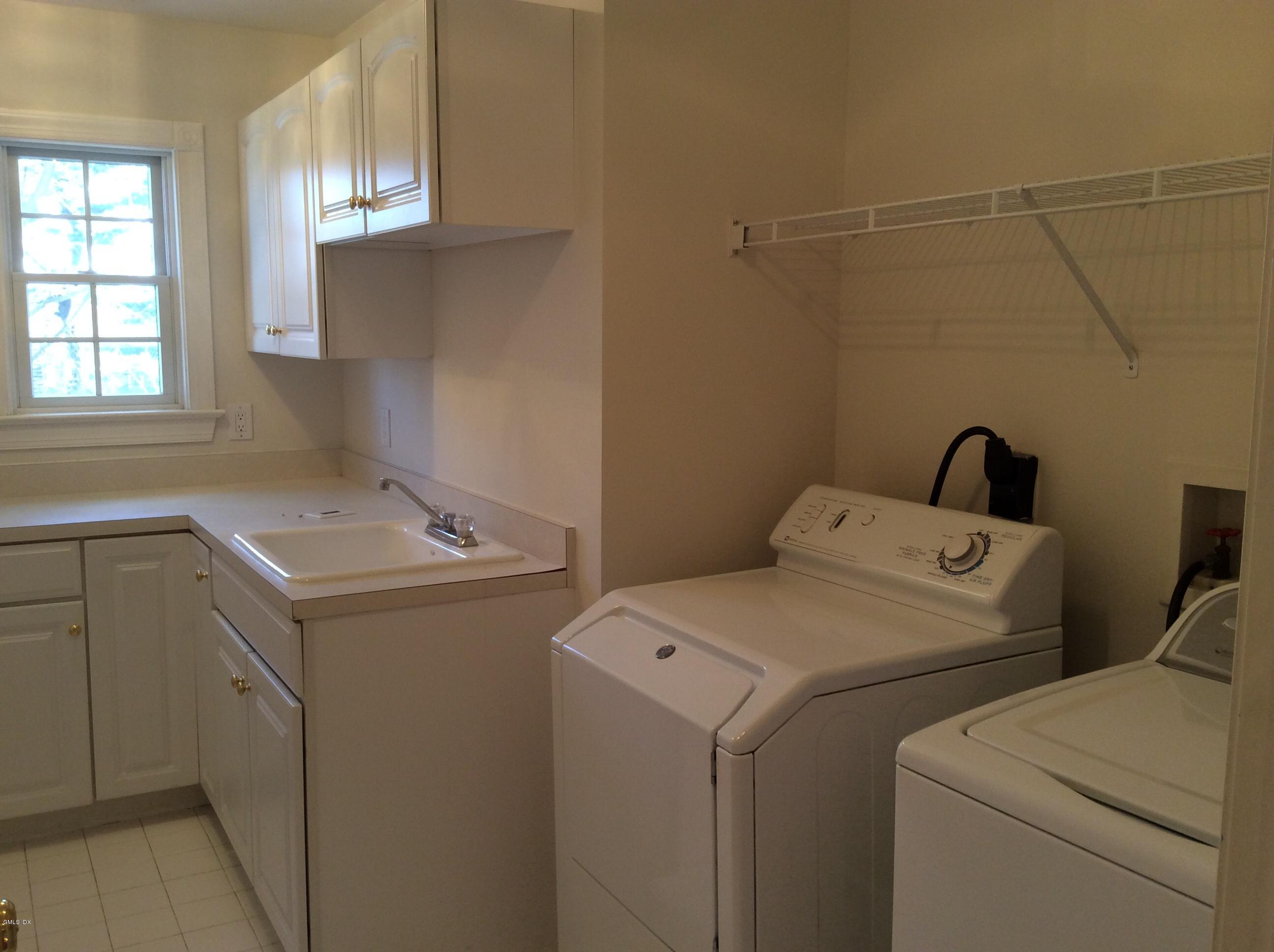 3 Stanwich Road Greenwich, CT 06830 - Photo 14 of 17 a utility room with dryer and washer