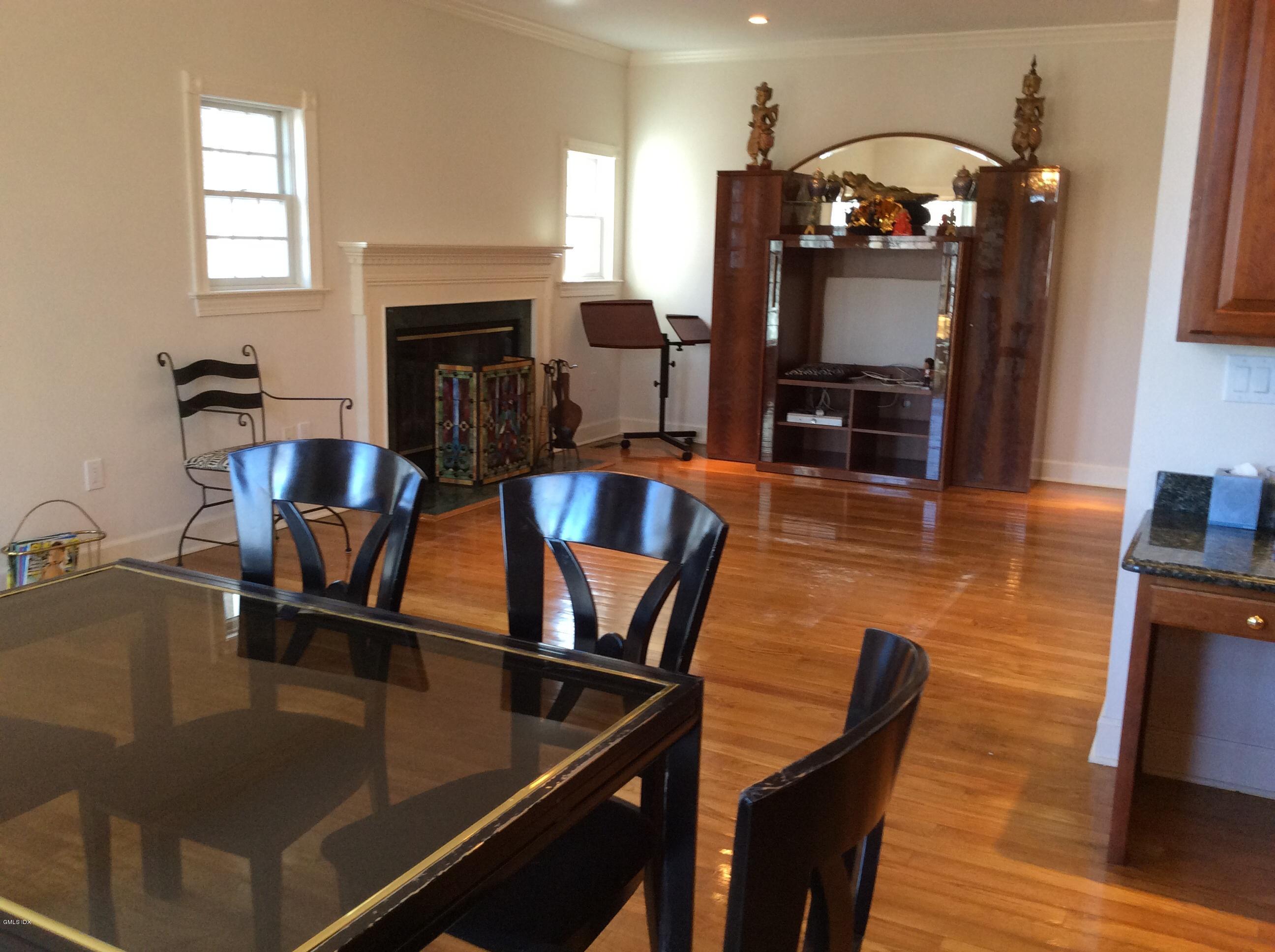 3 Stanwich Road Greenwich, CT 06830 - Photo 2 of 17 a view of a dining room with furniture and wooden floor