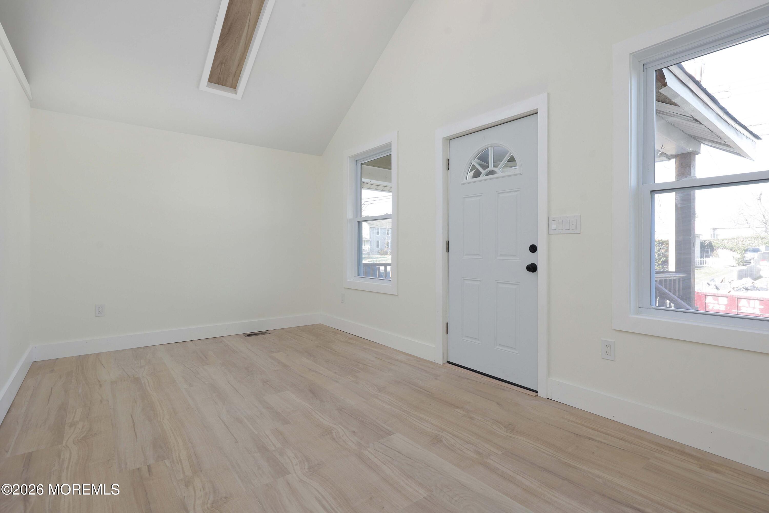 1216 8th Avenue Neptune, NJ 07753 - Photo 15 of 29 an empty room with windows