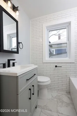 a bathroom with a bathtub