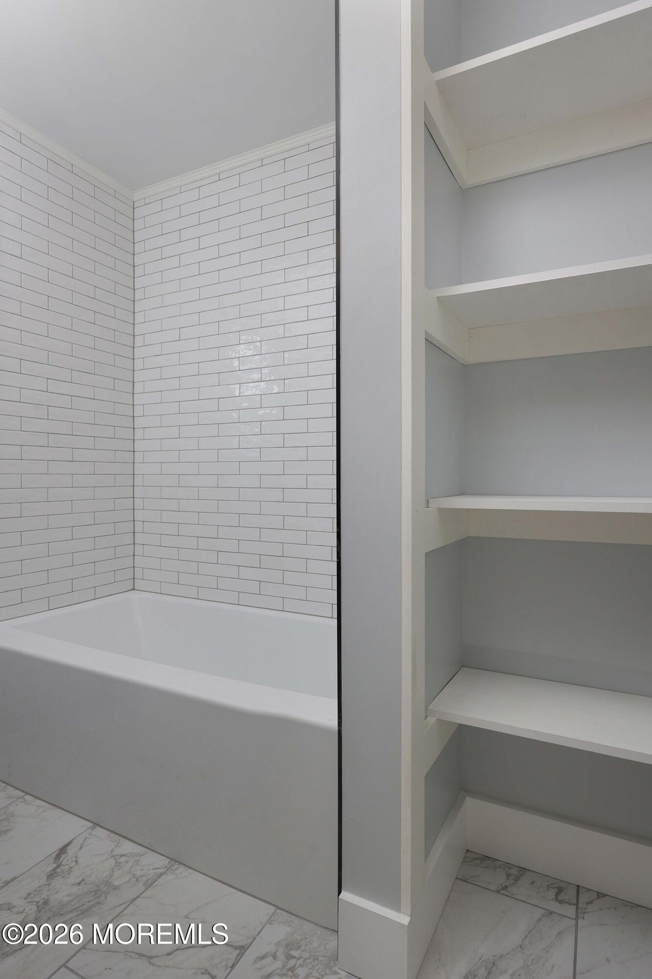 1216 8th Avenue Neptune, NJ 07753 - Photo 19 of 29 a bathroom with a bathtub