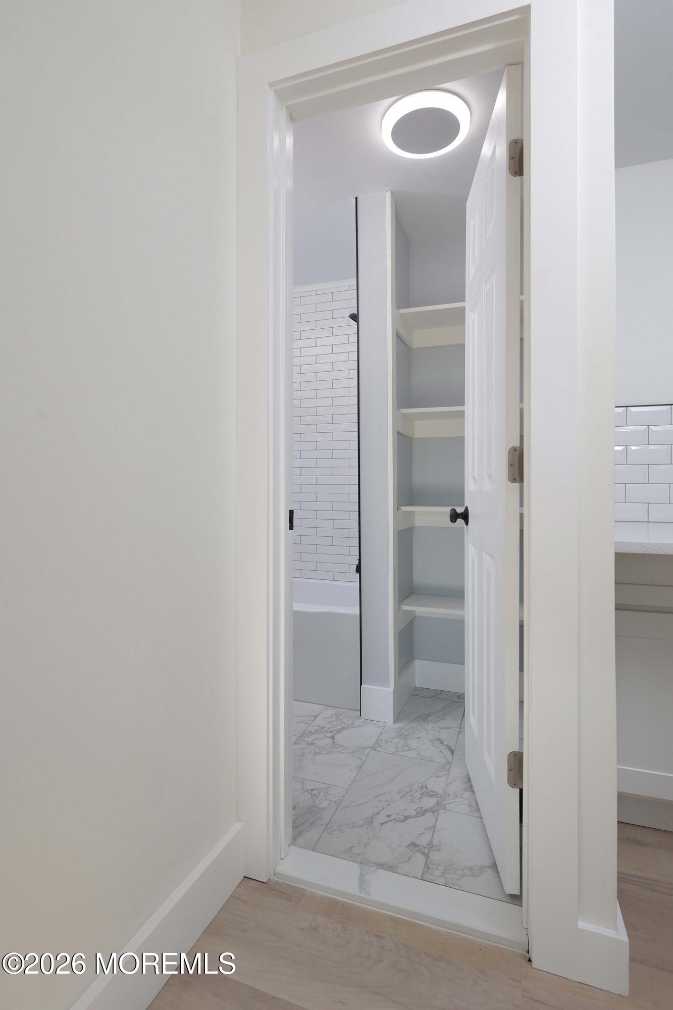 1216 8th Avenue Neptune, NJ 07753 - Photo 20 of 29 a bathroom with a shower