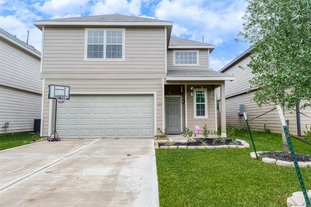 a front view of house with yard