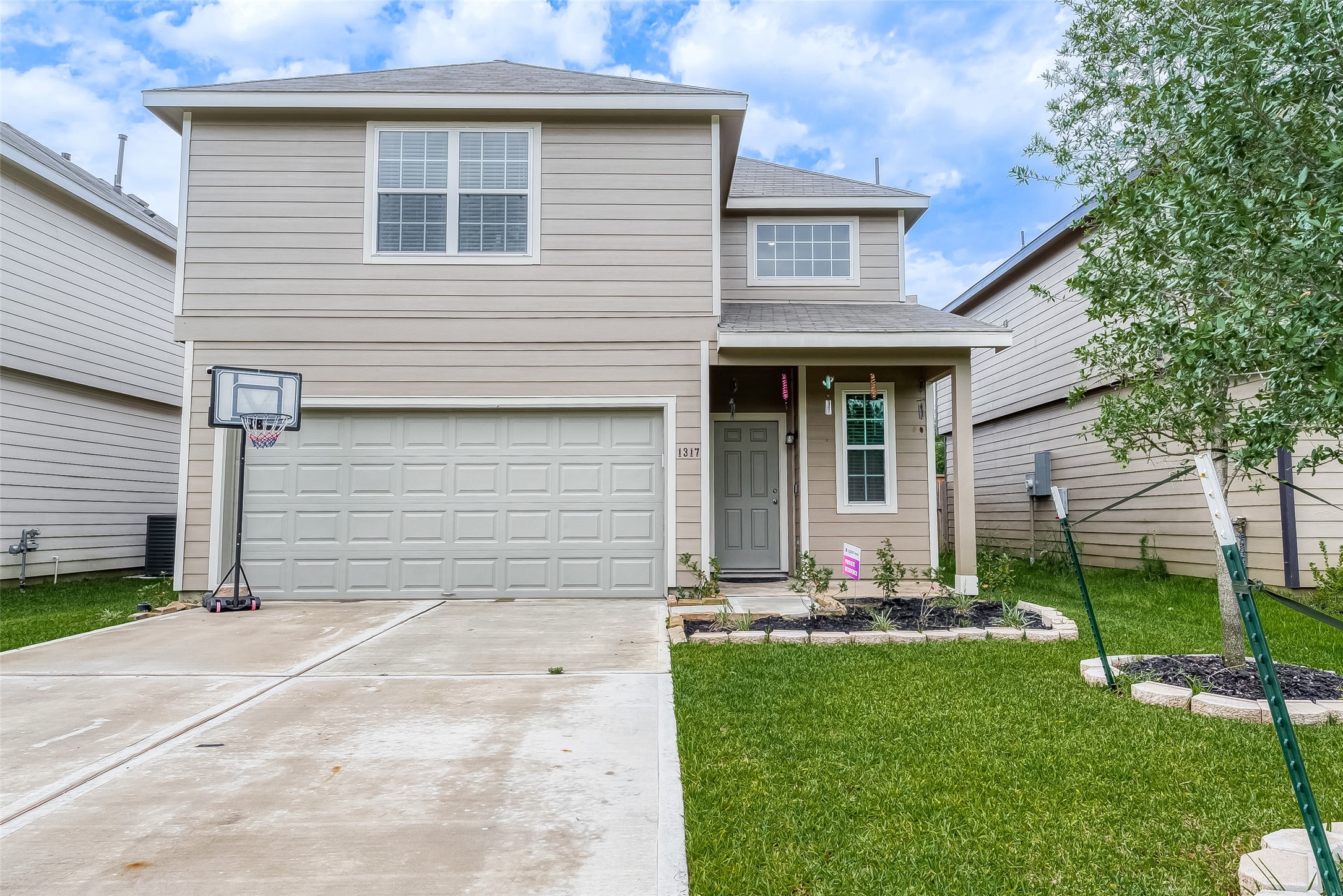 1317 Mount Bassie Trail Conroe, TX 77301 - Photo 1 of 50 a front view of house with yard