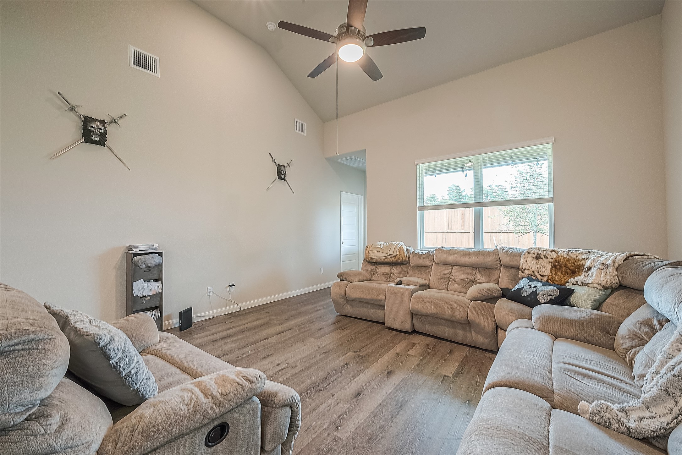 1317 Mount Bassie Trail Conroe, TX 77301 - Photo 22 of 50 a living room with furniture and a window