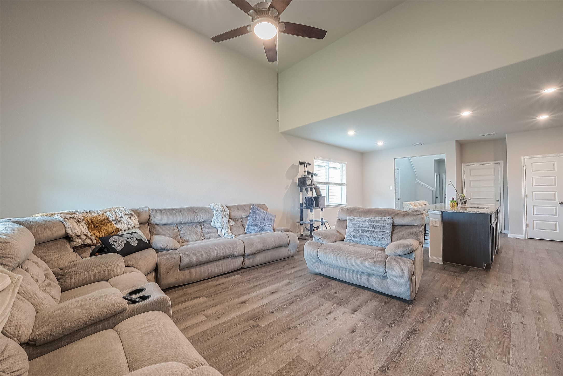 1317 Mount Bassie Trail Conroe, TX 77301 - Photo 23 of 50 a living room with furniture and a couch