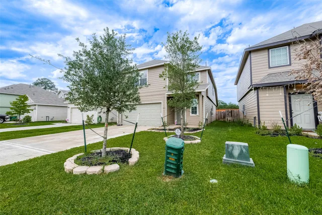 a swimming pool with outdoor seating and yard
