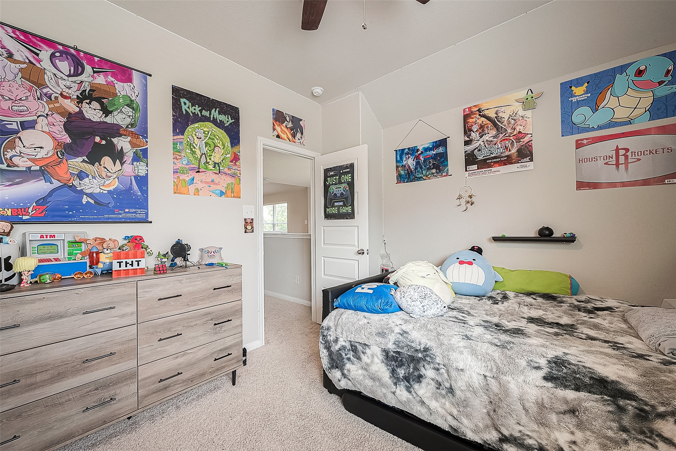 1317 Mount Bassie Trail Conroe, TX 77301 - Photo 39 of 50 a bedroom with a bed and painting on the wall