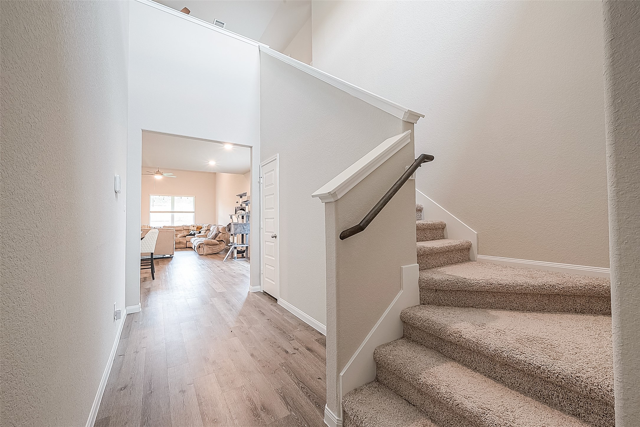 1317 Mount Bassie Trail Conroe, TX 77301 - Photo 8 of 50 a view of entryway and hall with wooden floor