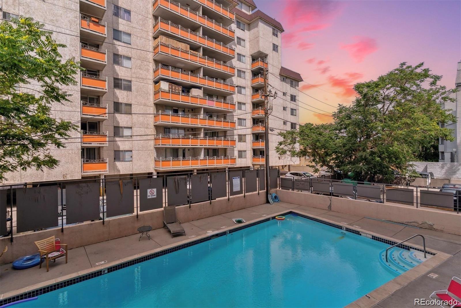 1121 Albion Street, Unit 207 Denver, CO 80220 - Photo 26 of 39 a view of pool with outdoor seating