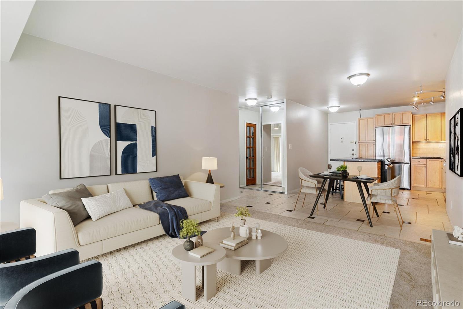 1121 Albion Street, Unit 207 Denver, CO 80220 - Photo 5 of 39 a living room with furniture and a dining table with kitchen view