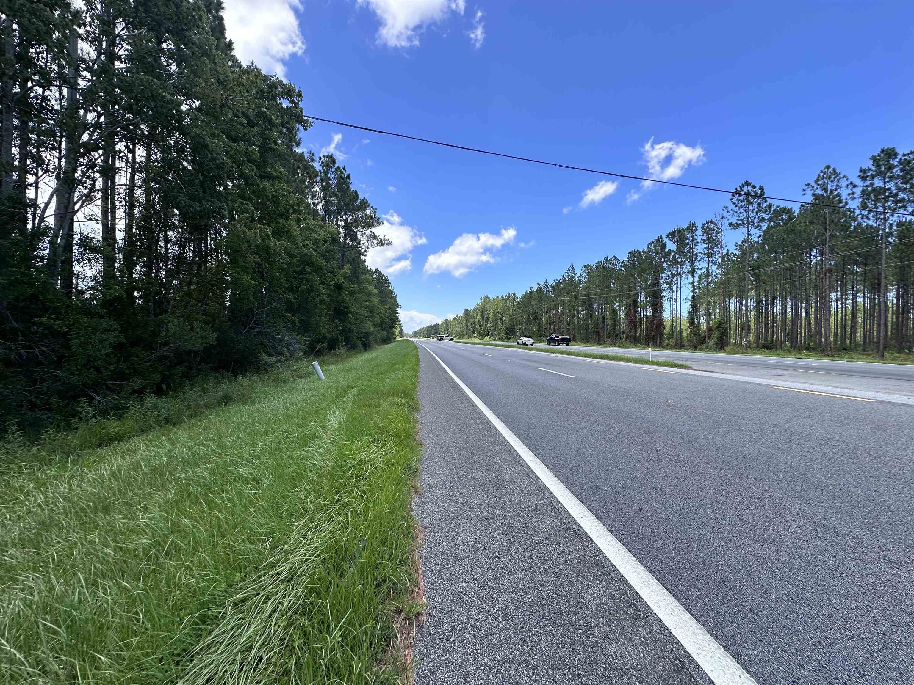 7537 Highway 1 St. Augustine, FL 32086 - Photo 4 of 14 a view of a street with a yard
