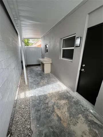 a room with furniture and window