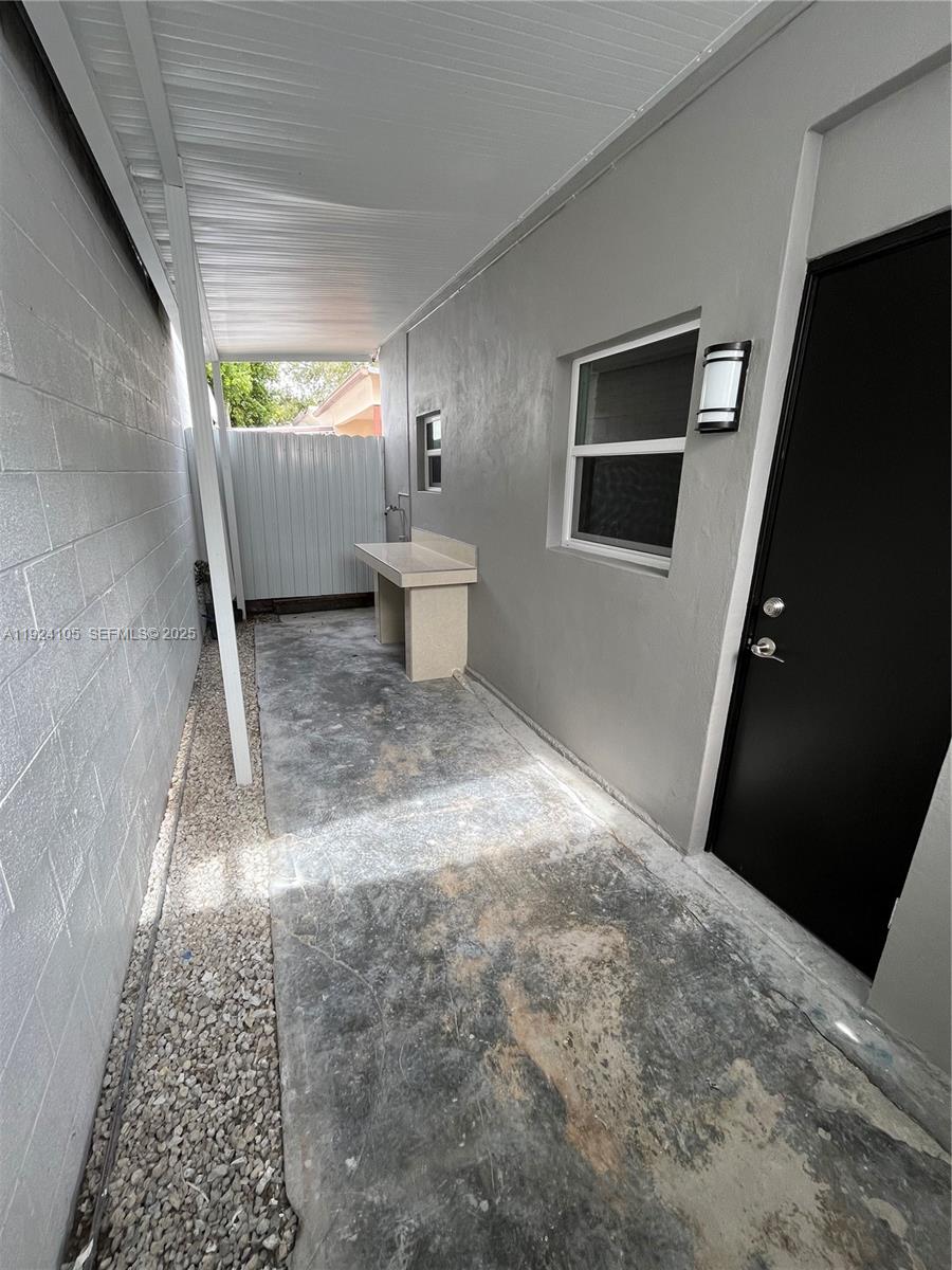 920 Southwest 30th Avenue, Unit 2 Miami, FL 33135 - Photo 17 of 18 a view of a bathroom with a sink and a toilet