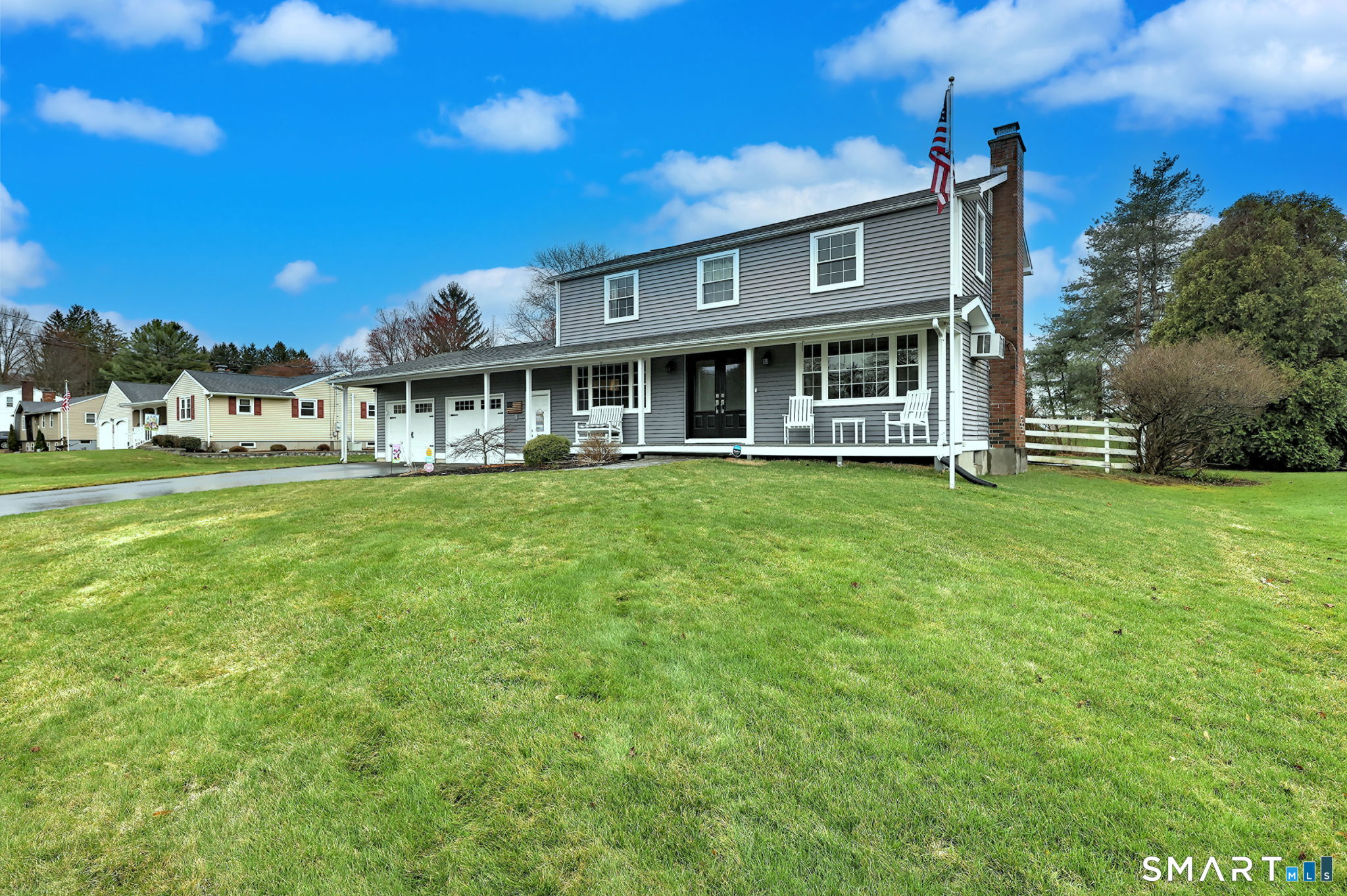 40 Sapphire Street Enfield, CT 06082 - Photo 2 of 41 a view of a house with a big yard and large trees