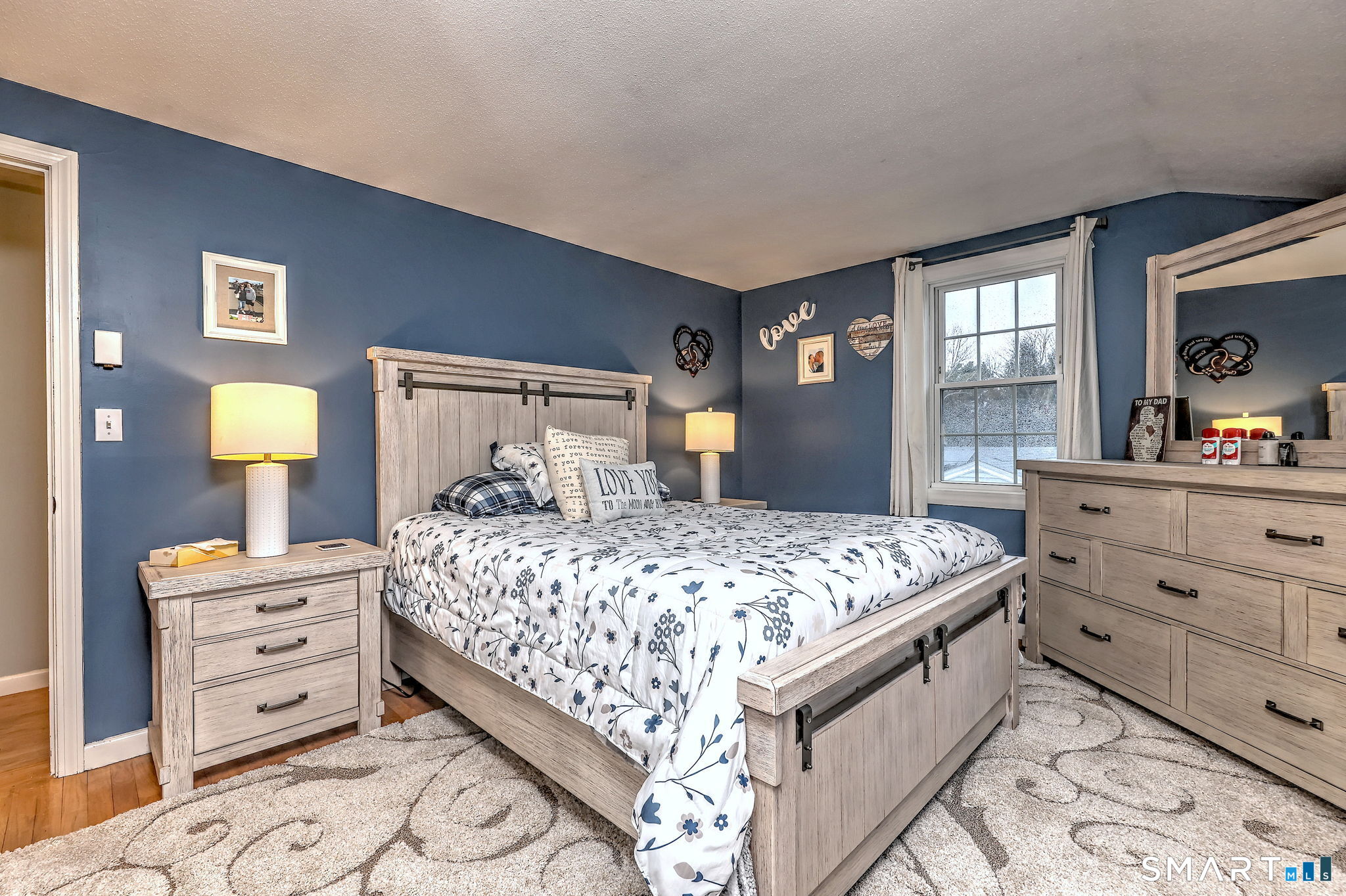 40 Sapphire Street Enfield, CT 06082 - Photo 24 of 41 a bedroom with a bed and a dresser