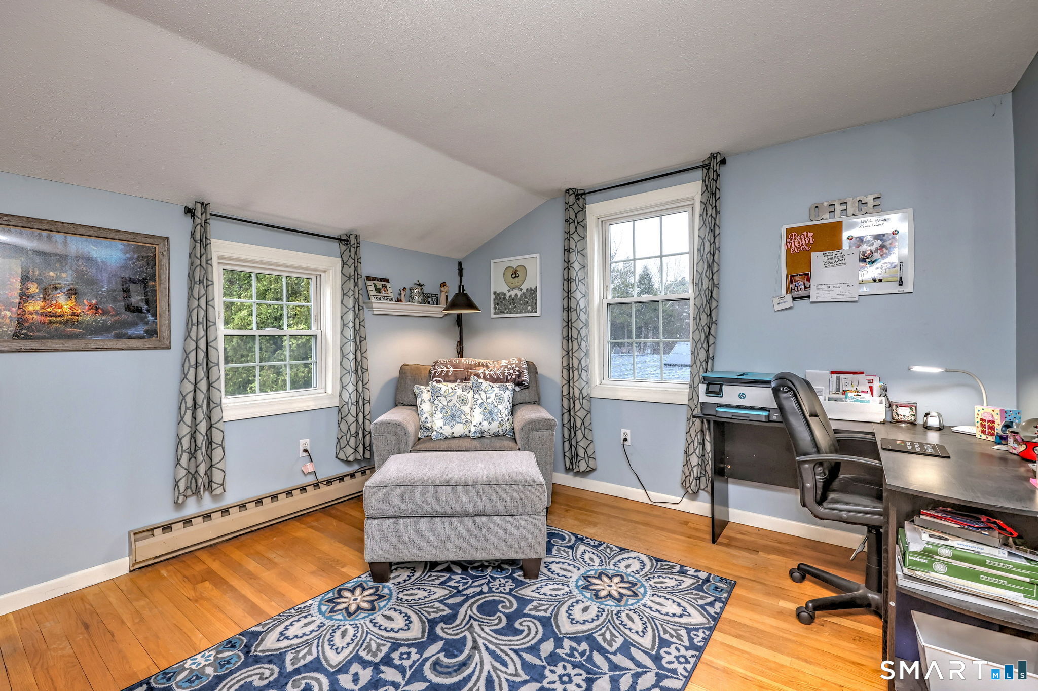 40 Sapphire Street Enfield, CT 06082 - Photo 26 of 41 a living room with furniture and a window