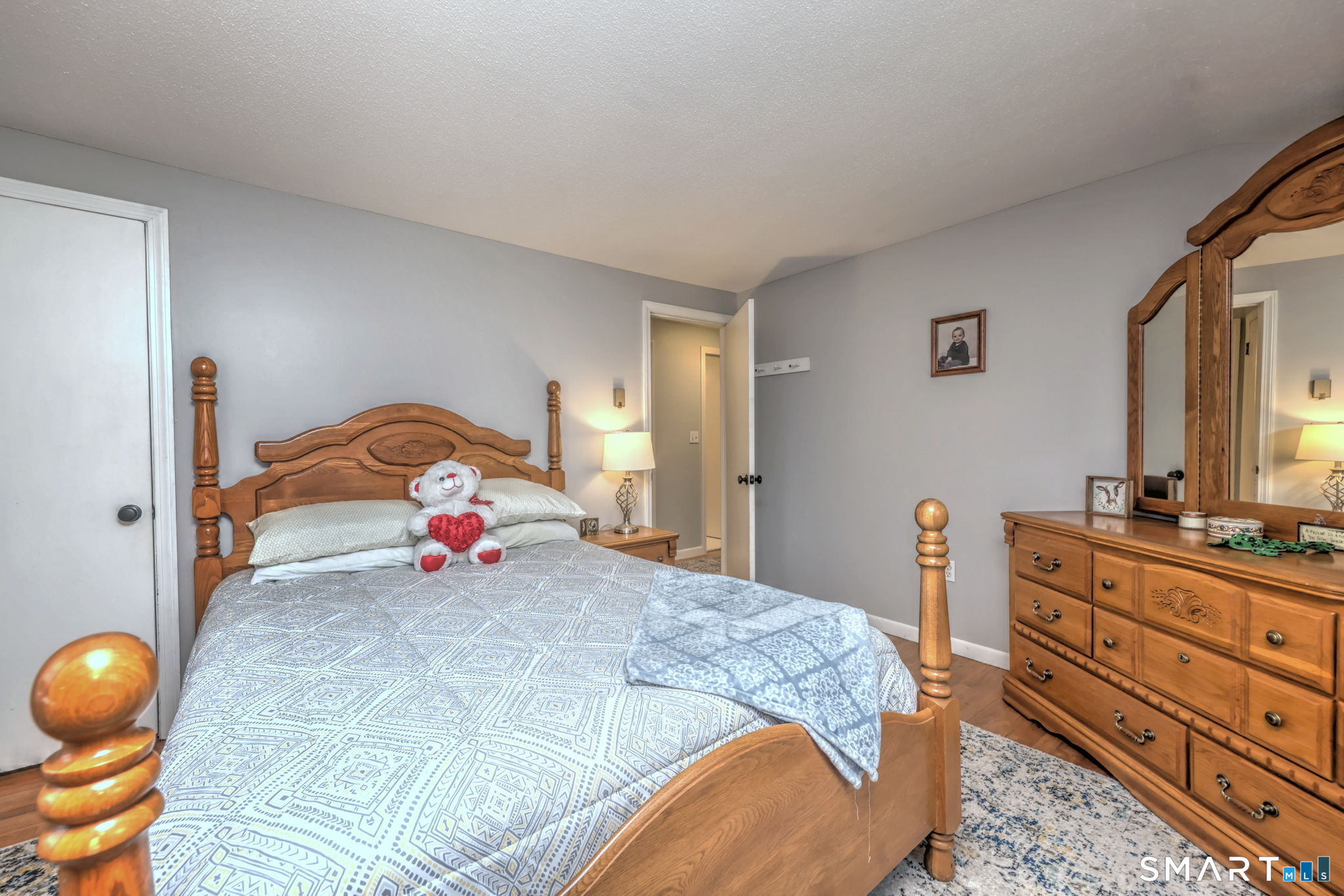 40 Sapphire Street Enfield, CT 06082 - Photo 28 of 41 a bedroom with a bed and a dresser