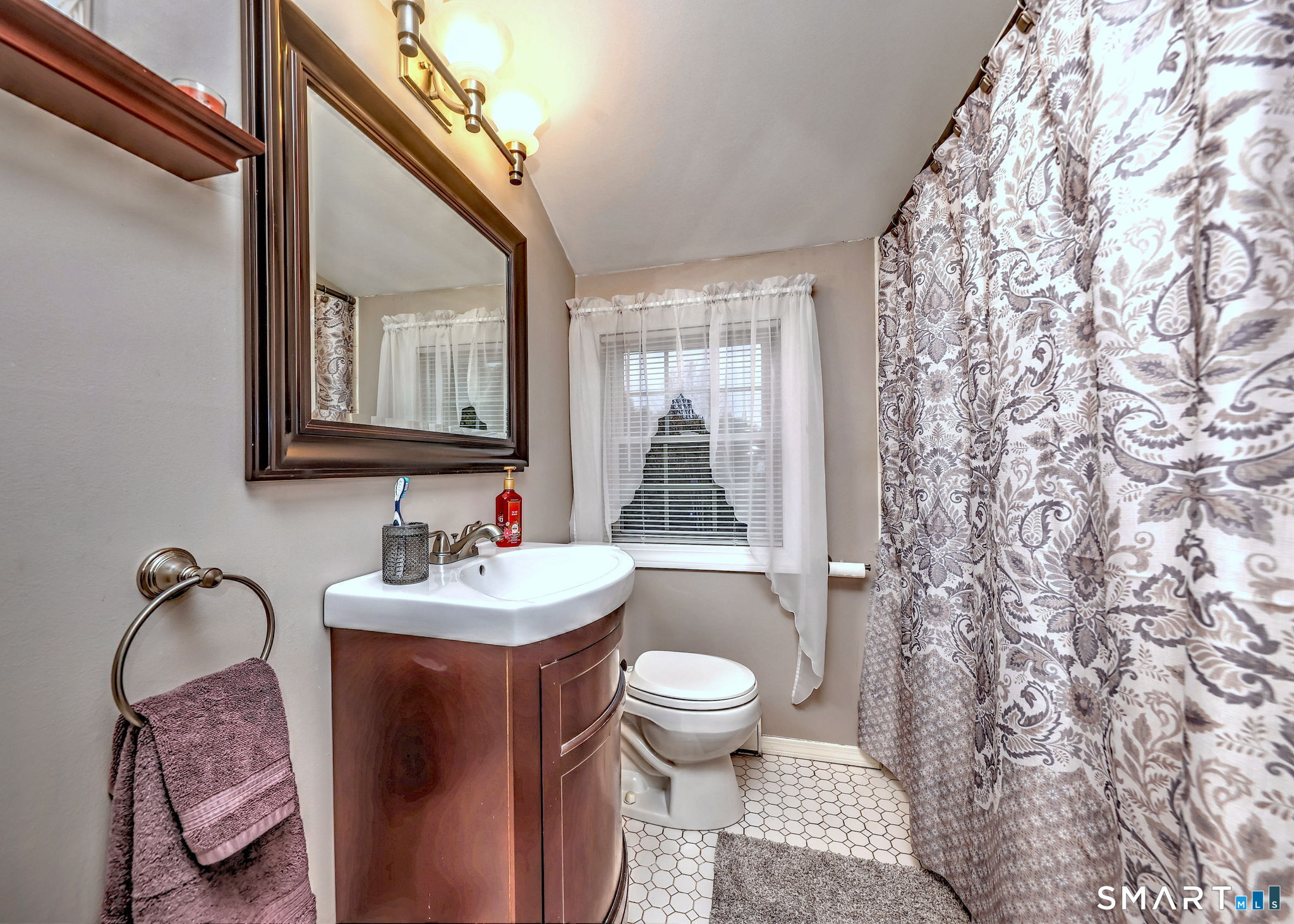 40 Sapphire Street Enfield, CT 06082 - Photo 29 of 41 a bathroom with a sink toilet and mirror