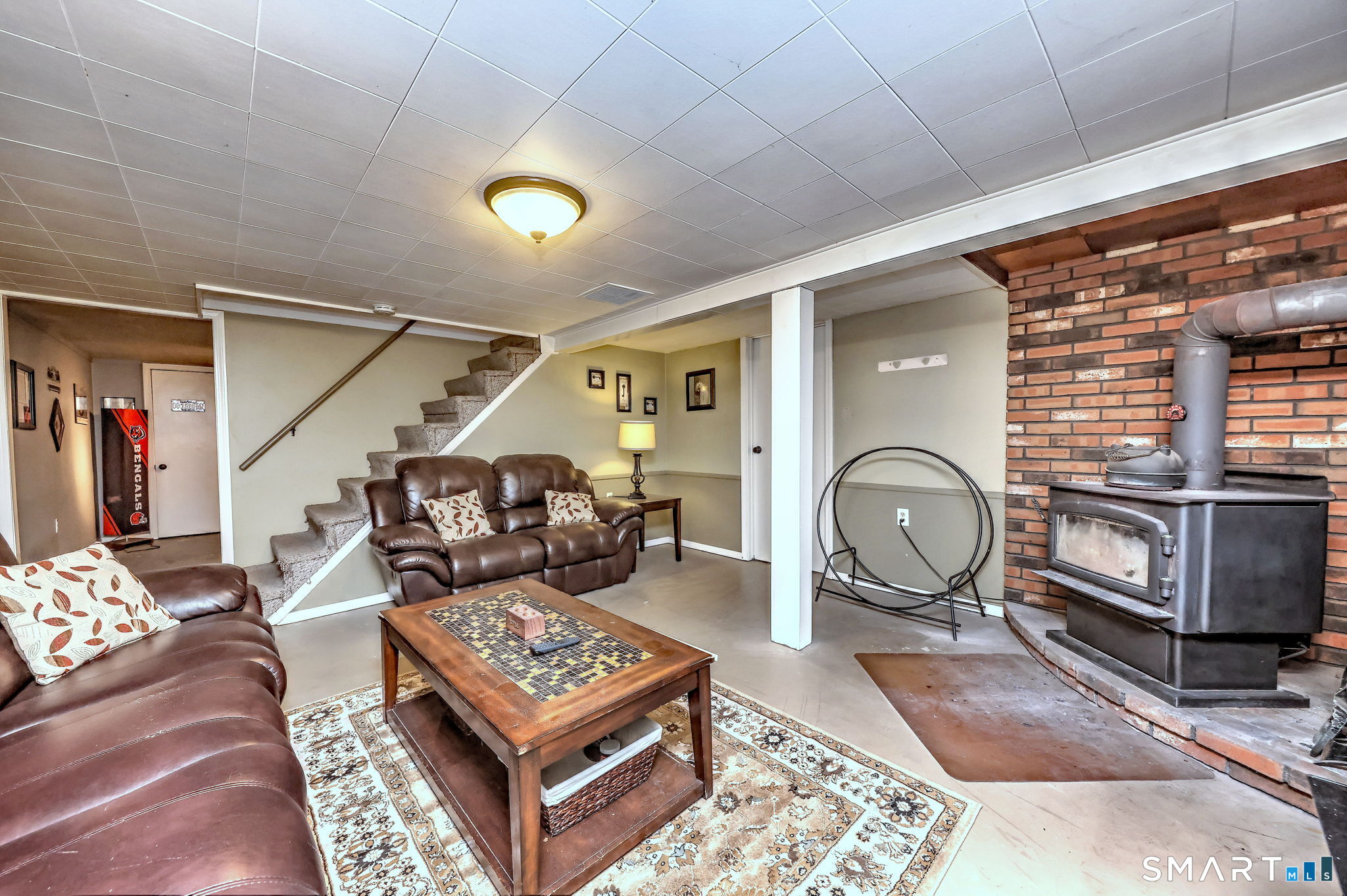 40 Sapphire Street Enfield, CT 06082 - Photo 32 of 41 a living room with furniture a rug and a window