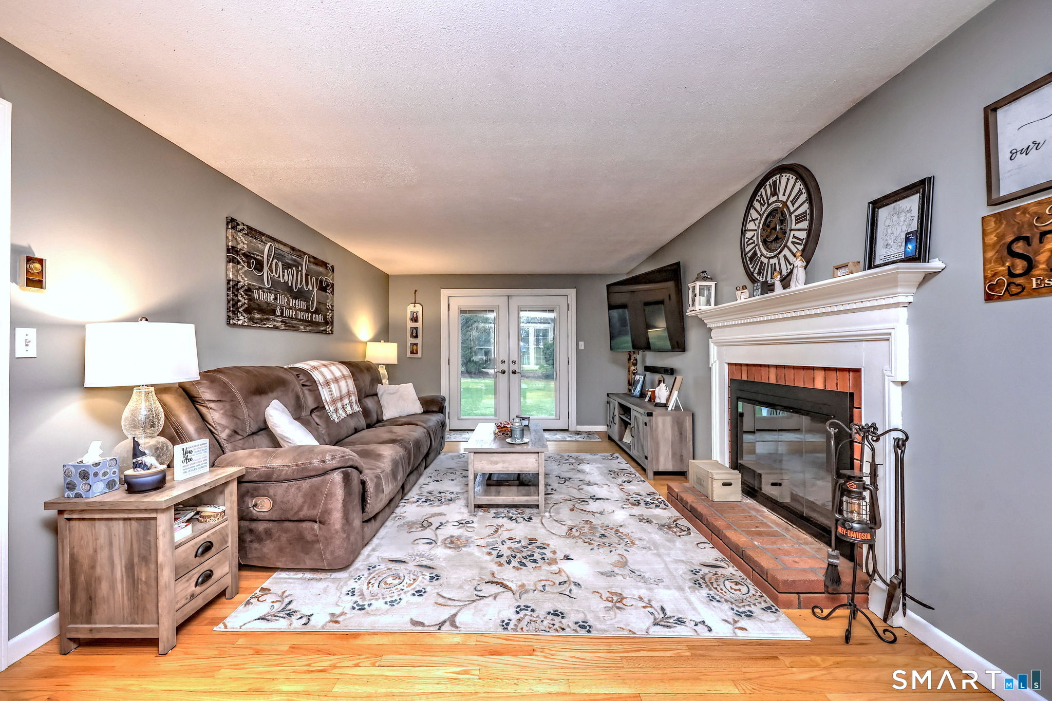 40 Sapphire Street Enfield, CT 06082 - Photo 6 of 41 a living room with furniture and a fireplace