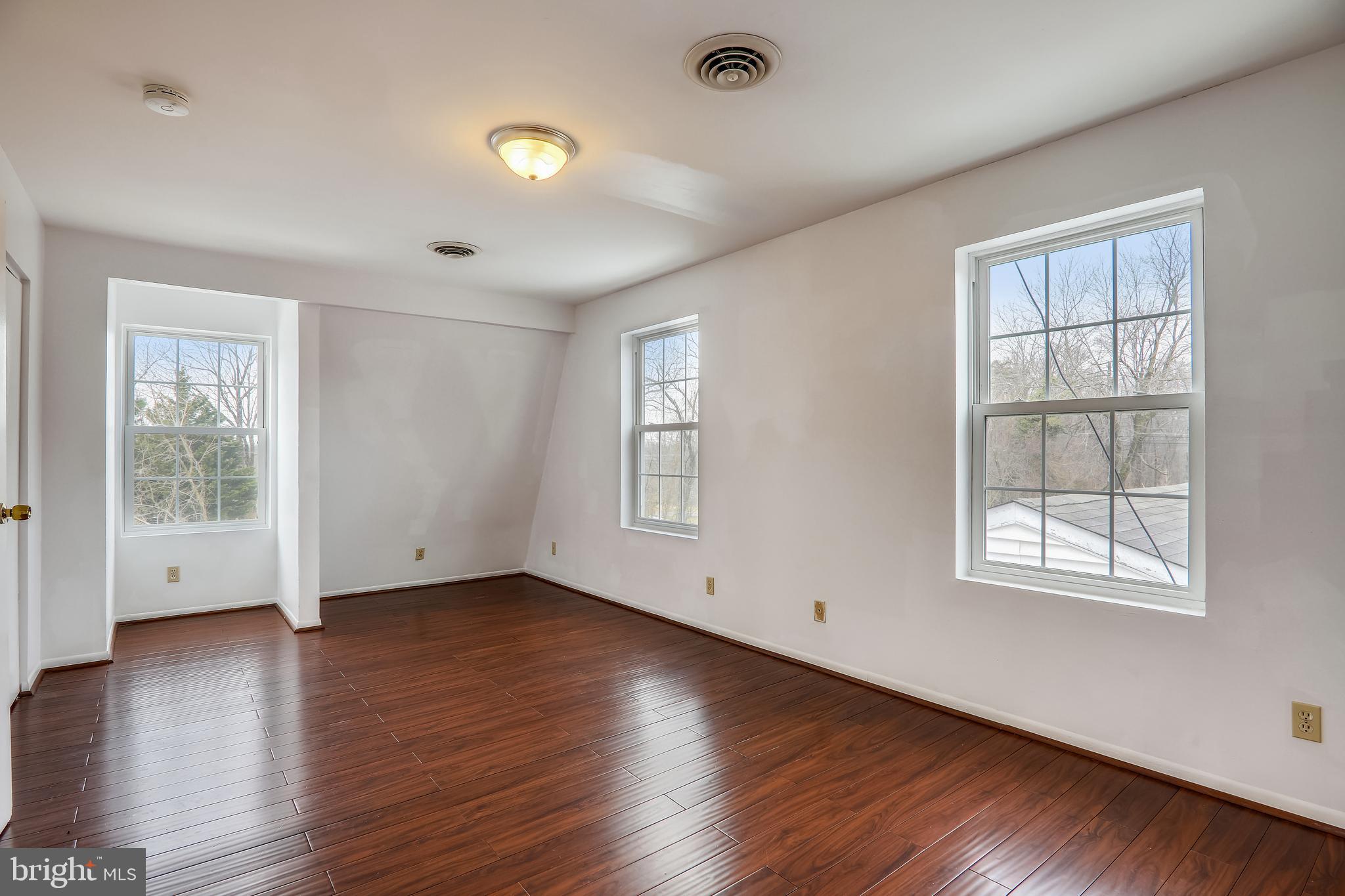 2802 Norbeck Road Silver Spring, MD 20906 - Photo 13 of 43 Master Bedroom (3 windows)