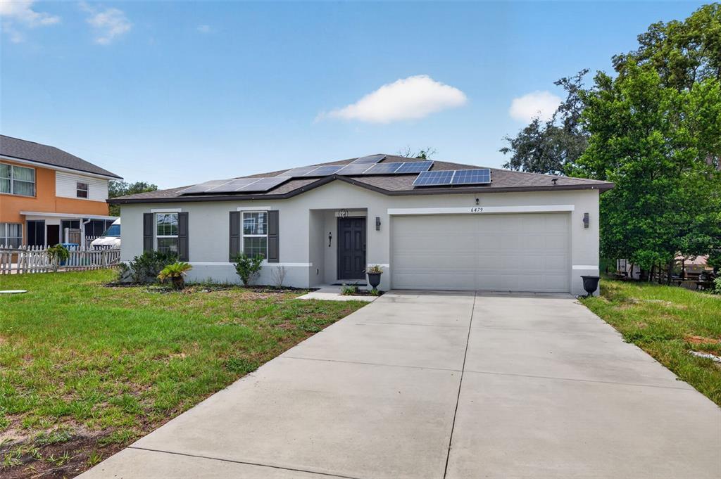 6479 Grapewood Road Spring Hill, FL 34609 - Photo 3 of 24
