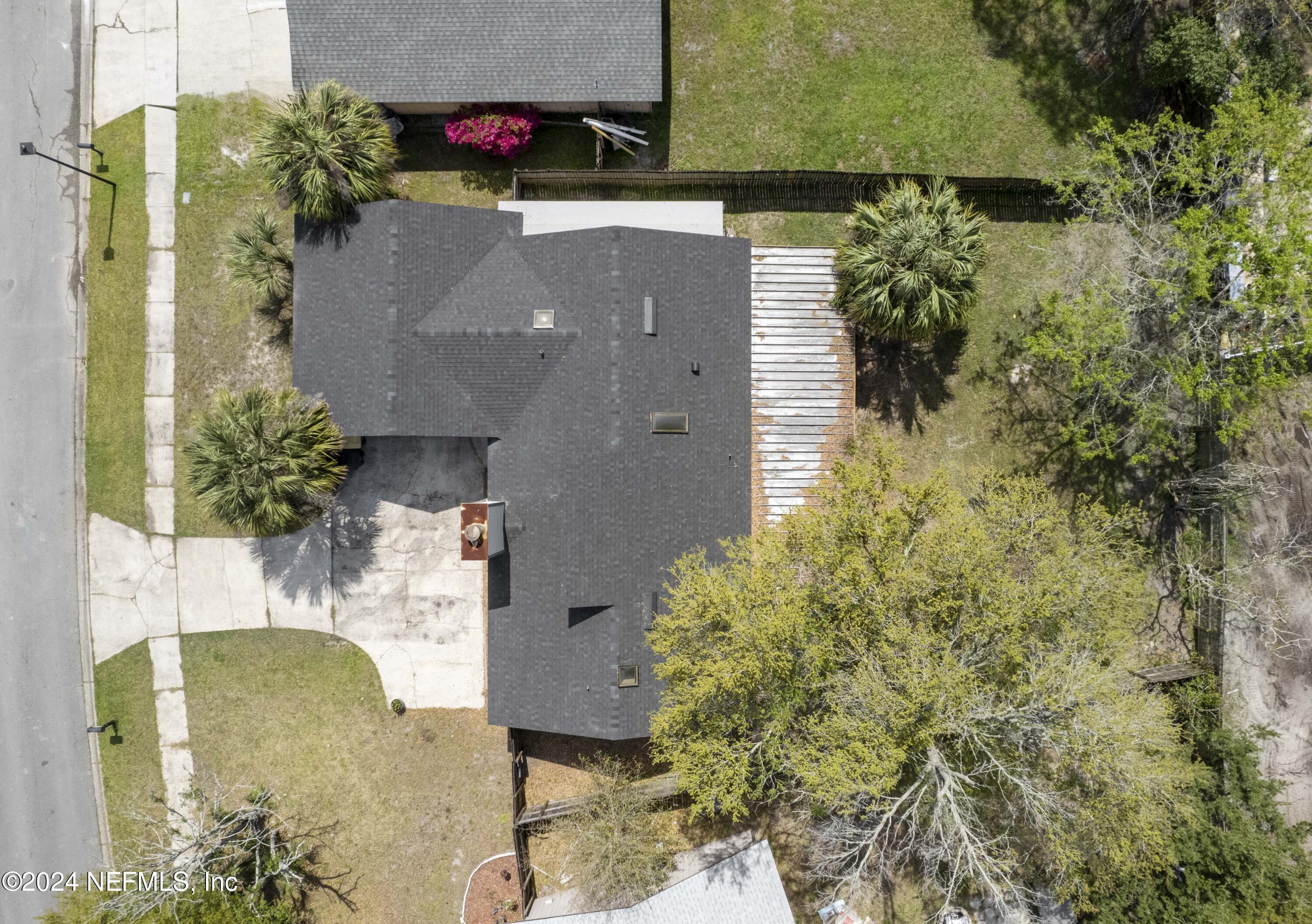 2532 Wattle Tree Road West Jacksonville, FL 32246 - Photo 24 of 25 an aerial view of a house with a yard