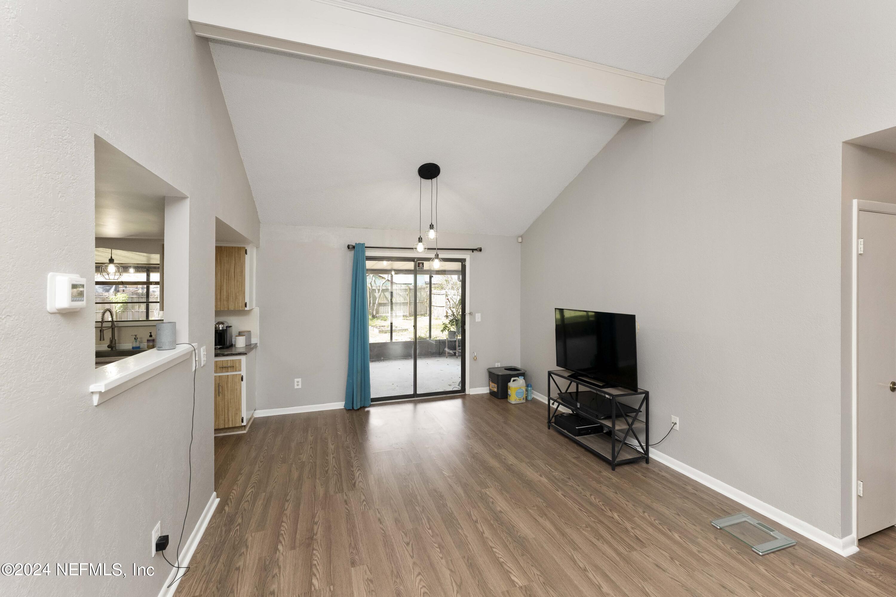 2532 Wattle Tree Road West Jacksonville, FL 32246 - Photo 8 of 25 a view of room with wooden floor and furniture