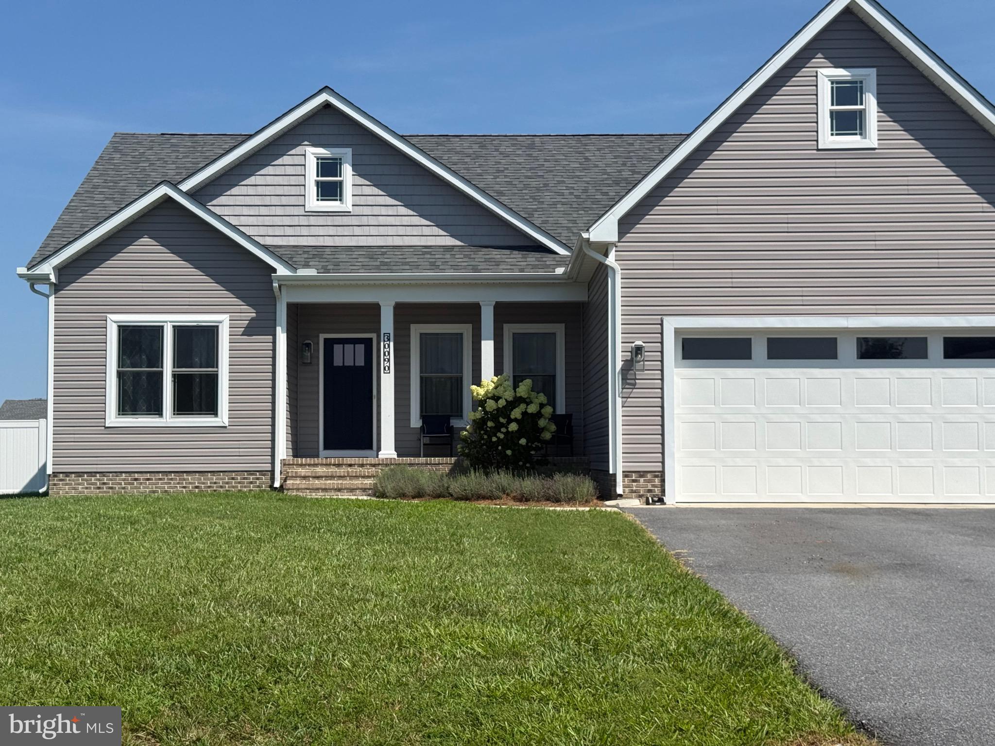 30090 Indian Cottage Road Princess Anne, MD 21853 - Photo 2 of 59 a front view of a house with a yard