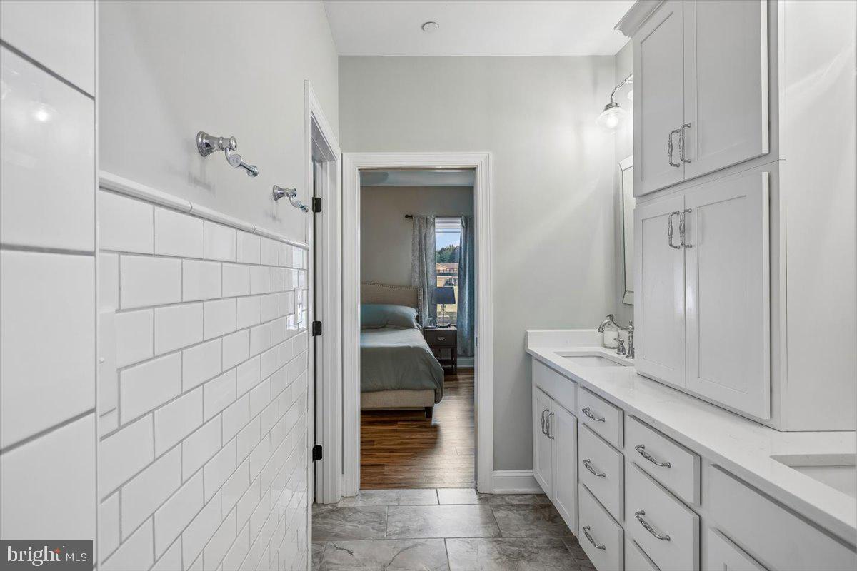30090 Indian Cottage Road Princess Anne, MD 21853 - Photo 25 of 59 Custom cabinetry, tile bathroom