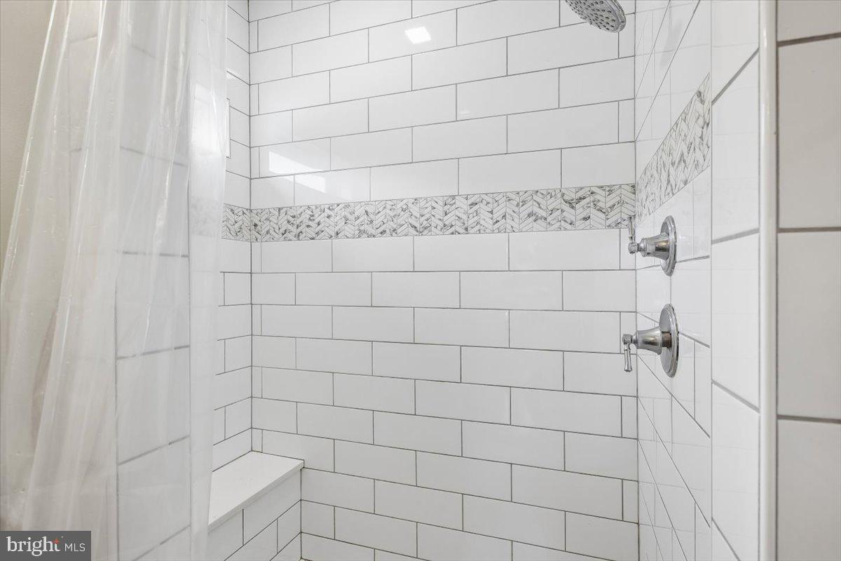 30090 Indian Cottage Road Princess Anne, MD 21853 - Photo 26 of 59 Drop dead gorgeous tile shower with a window!