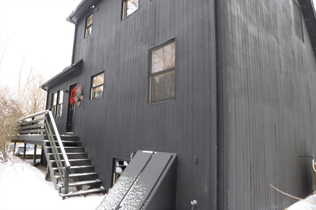 6 Path Road Tolland, MA 01034 - Photo 2 of 36 a view of an entryway with stairs
