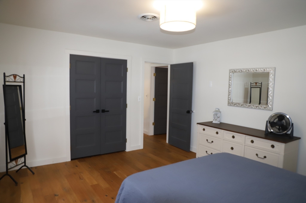 6 Path Road Tolland, MA 01034 - Photo 22 of 36 a bedroom with a bed and a dresser