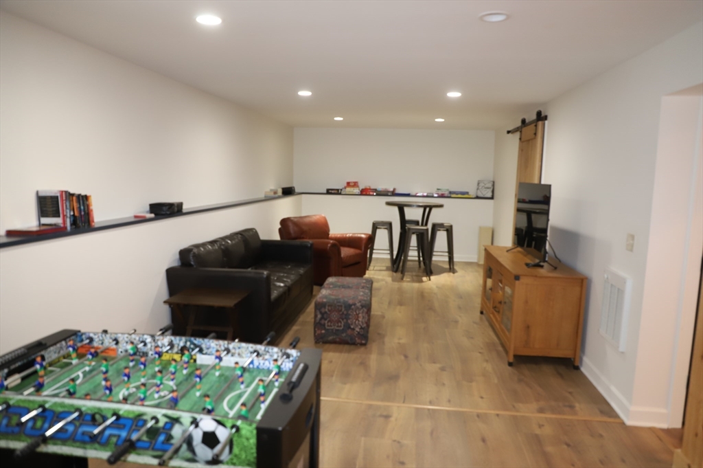6 Path Road Tolland, MA 01034 - Photo 29 of 36 a living room with furniture and a table