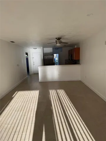 a bathroom with a shower and a sink