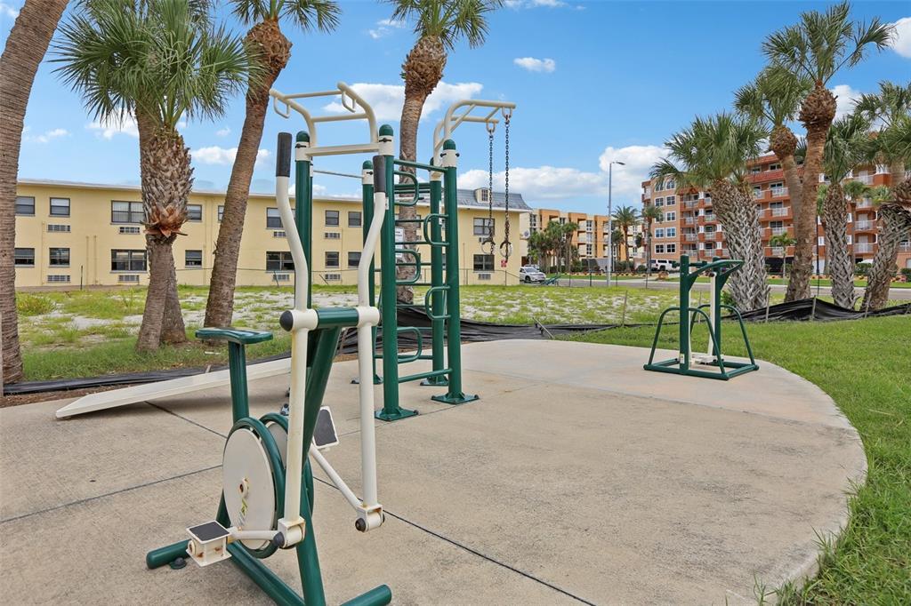 16033 Redington Drive Redington Beach, FL 33708 - Photo 22 of 26 a view of a park with swings