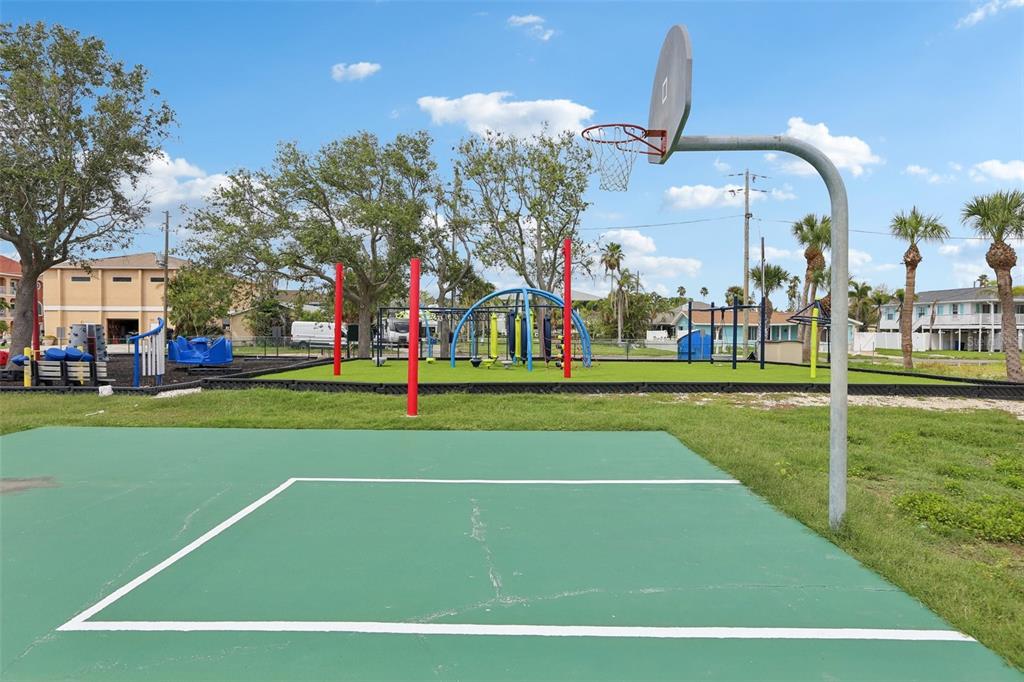 16033 Redington Drive Redington Beach, FL 33708 - Photo 23 of 26 a view of a tennis court