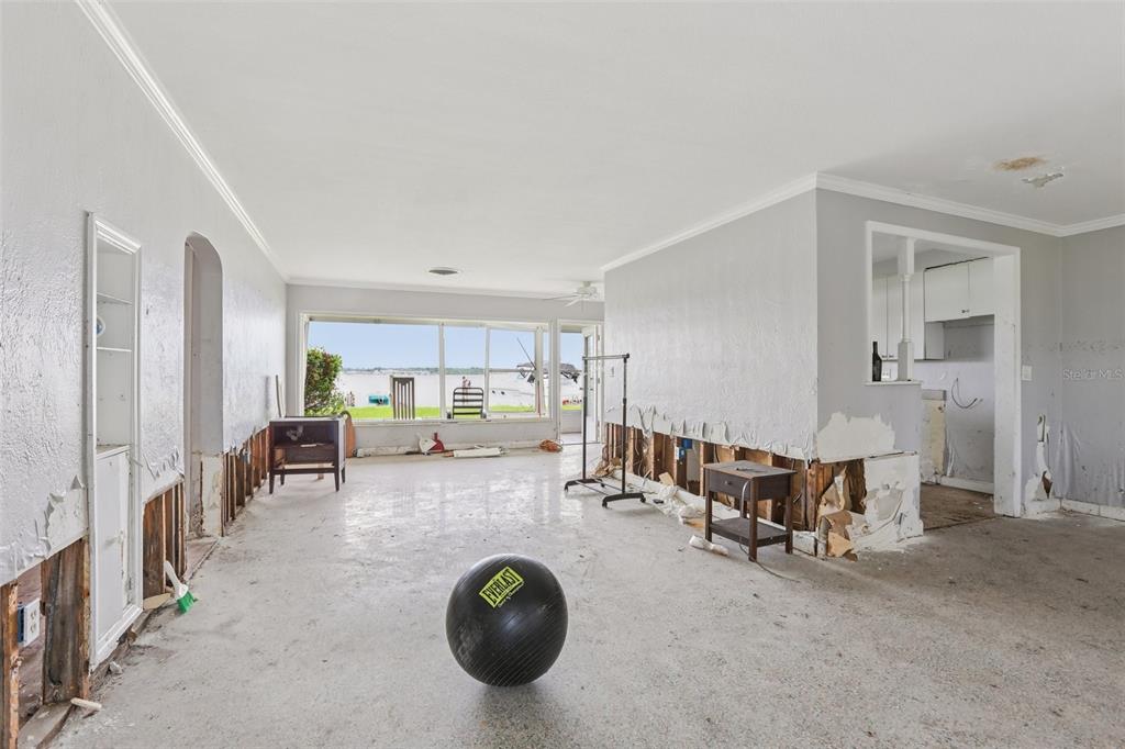 16033 Redington Drive Redington Beach, FL 33708 - Photo 6 of 26 a view of a living room and dining room