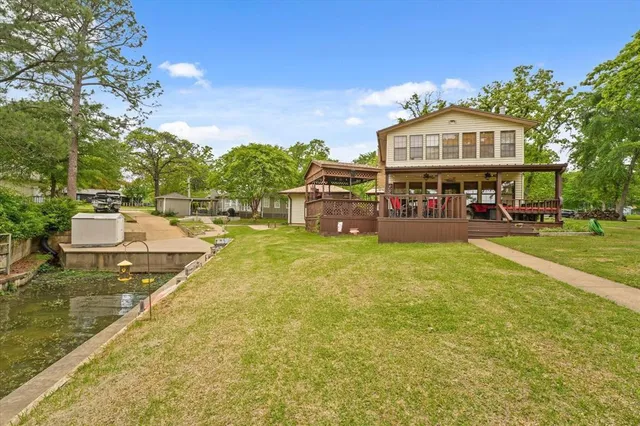a view of swimming pool with chairs
