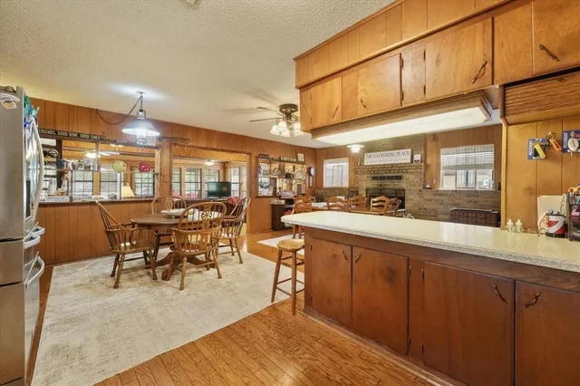 a bedroom with a large bed and a dresser