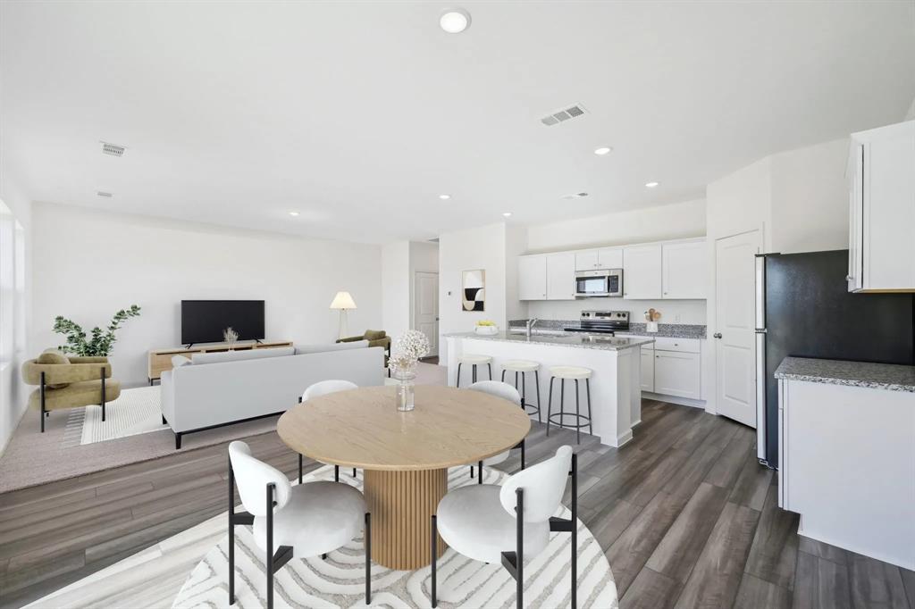 2108 Prairie Lane Melissa, TX 75454 - Photo 3 of 21 Kitchen and Family Room