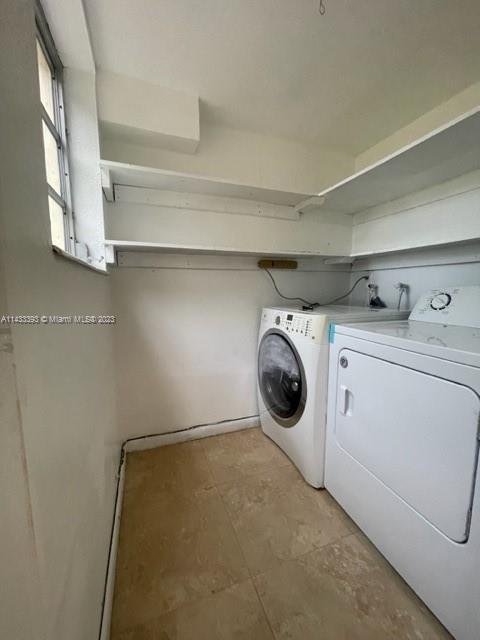8327 Southwest 137th Avenue, Unit 8327 Miami, FL 33183 - Photo 12 of 31 a utility room with dryer and washer