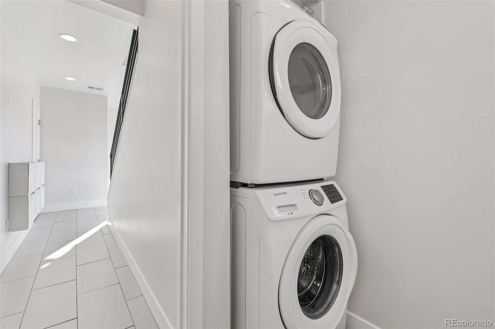 1274 Quitman Street, Unit 6 Denver, CO 80204 - Photo 15 of 50 a utility room with dryer and washer