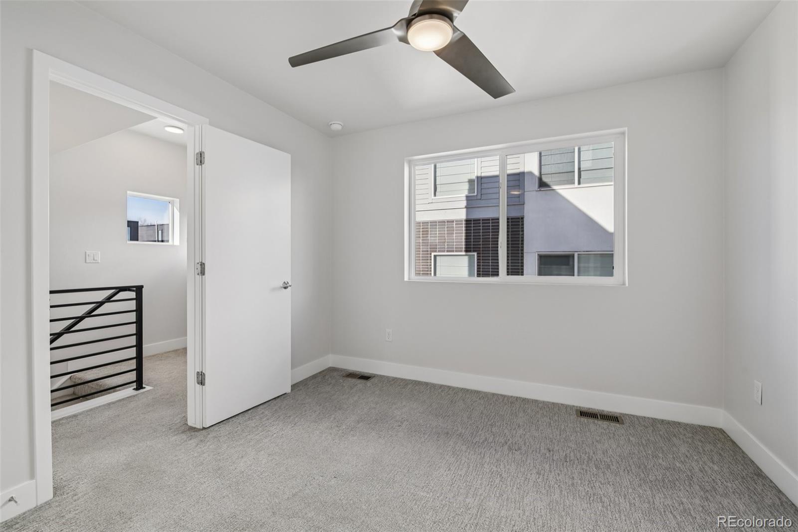 1274 Quitman Street, Unit 6 Denver, CO 80204 - Photo 18 of 50 a view of an empty room with a window