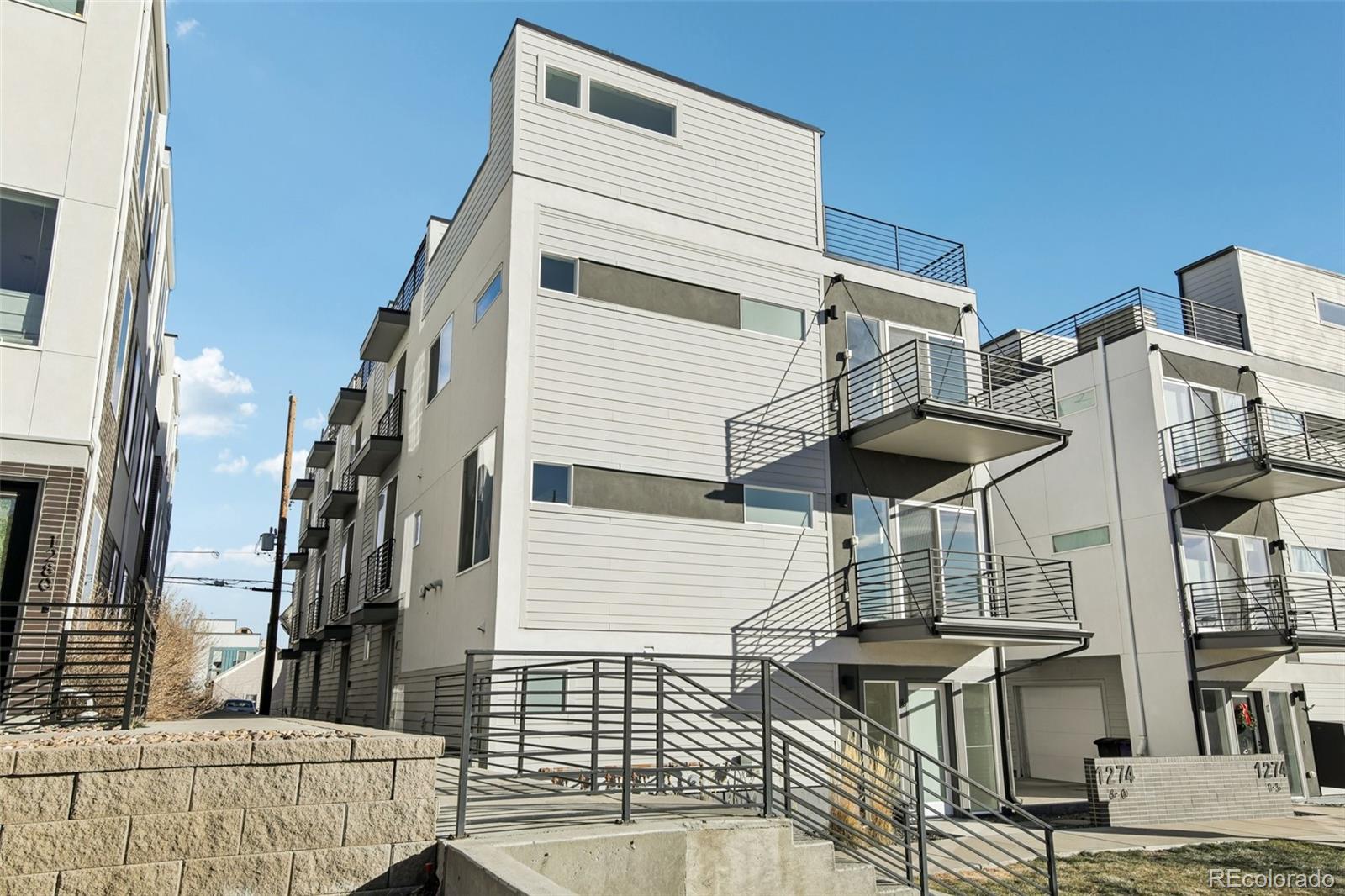 1274 Quitman Street, Unit 6 Denver, CO 80204 - Photo 29 of 50 a view of entryway with a front door