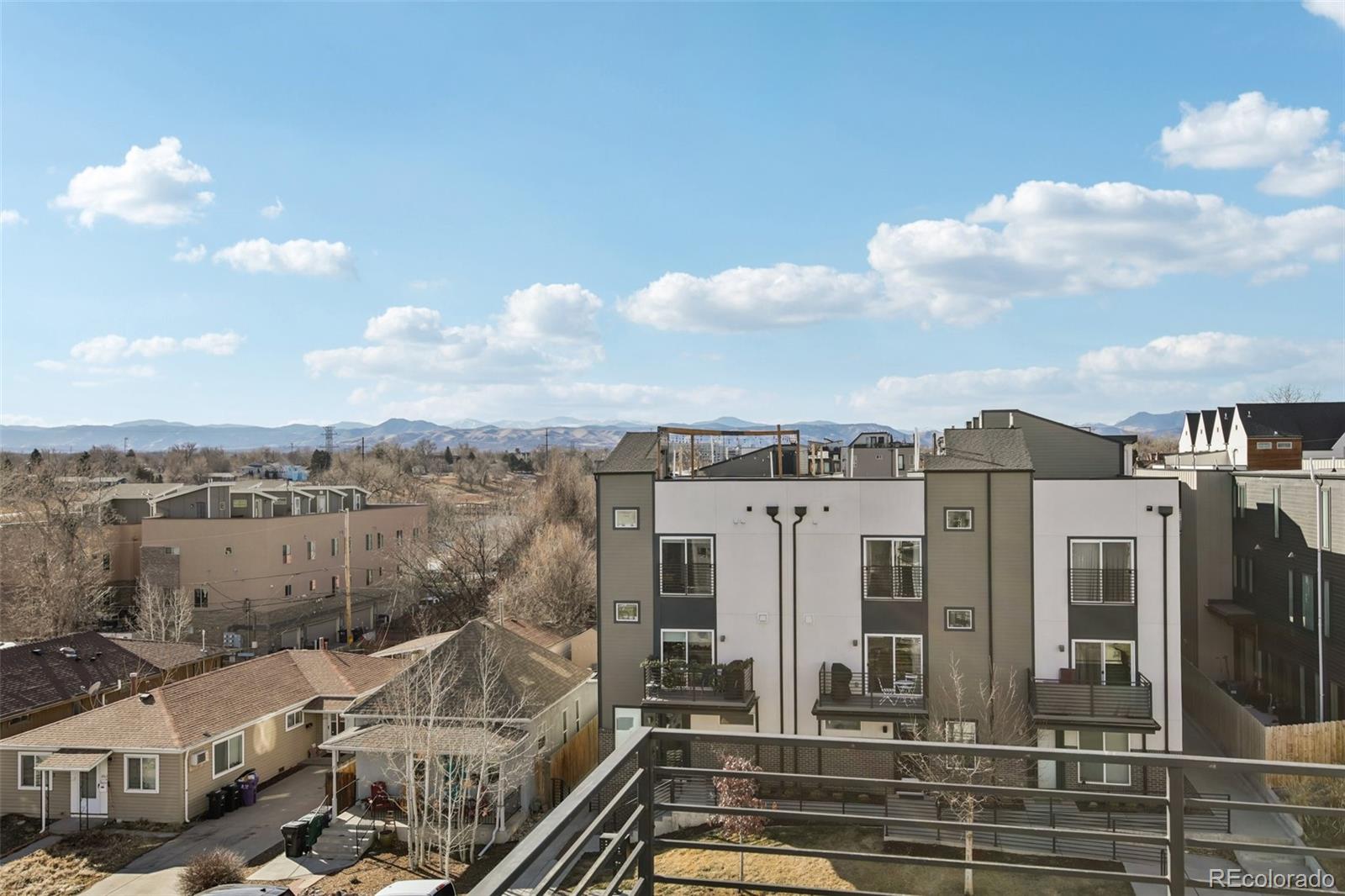 1274 Quitman Street, Unit 6 Denver, CO 80204 - Photo 34 of 50 a view of a city with tall buildings