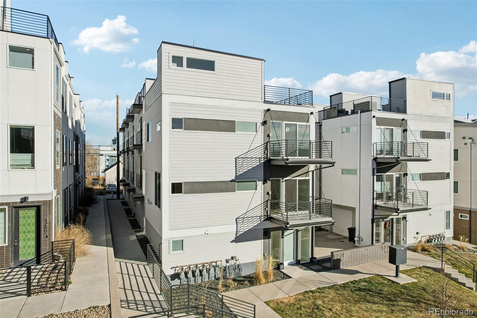 1274 Quitman Street, Unit 6 Denver, CO 80204 - Photo 35 of 50 a view of a city with tall buildings