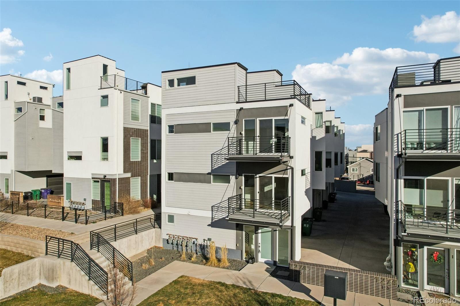 1274 Quitman Street, Unit 6 Denver, CO 80204 - Photo 36 of 50 a view of city with tall buildings